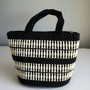 Uniquely beaded handbag.